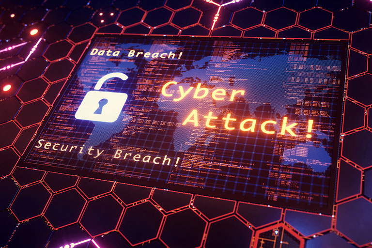 An abstract image depicting the text cyberattack and security breach, with a semi-transparent world map background.