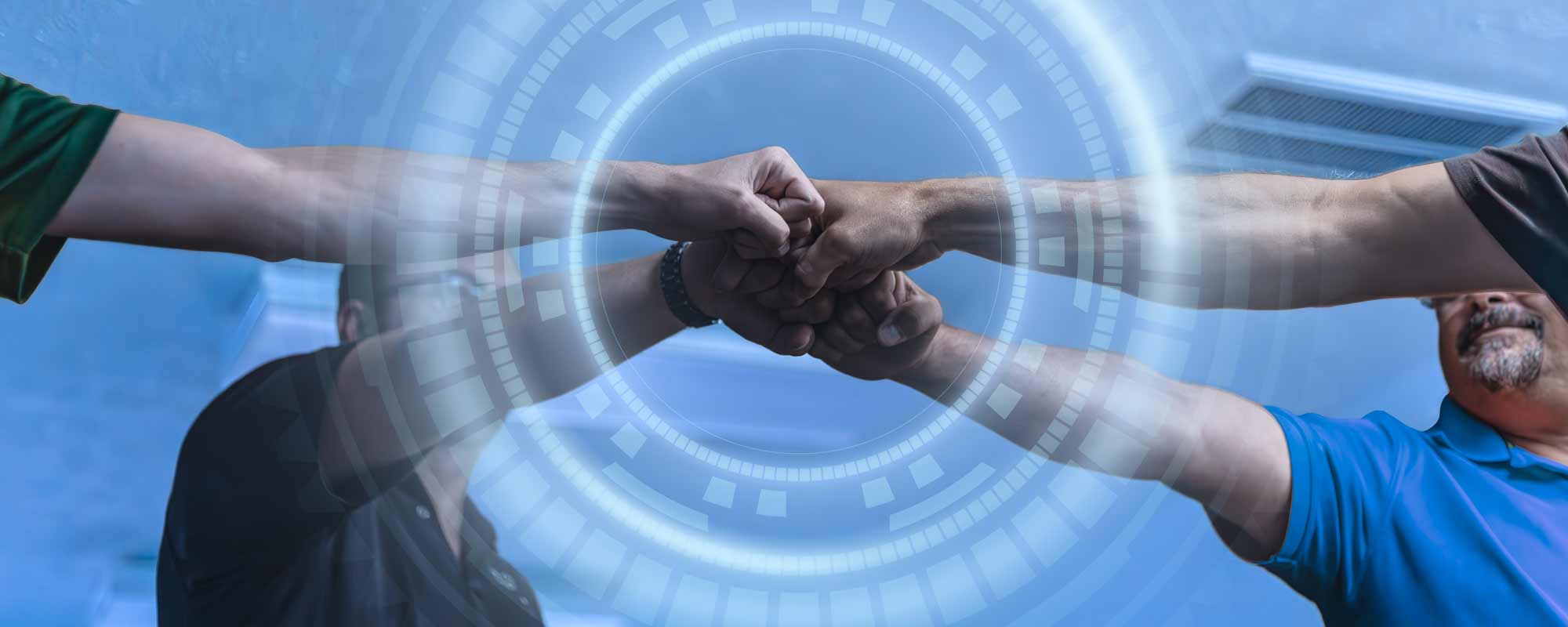 Members of the NRC team giving a fist bump.